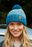 Pachamama - Cotopaxi Knitted Women's Bold Stripe Bobble Hat in 'Teal'